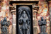 The great Chola temples of Tamil Nadu - The Airavatesvara temple of Darasuram. Koshta image of Ligodbhava on the West Side of the vimana, with Brahama and Vishnu by the sides.  